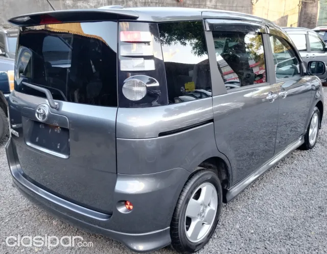 Toyota Sienta 2009 — foto 6