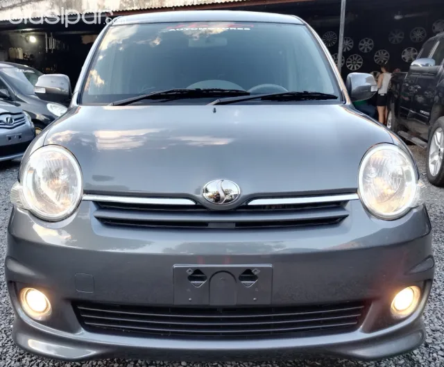 Toyota Sienta 2009 — foto 7