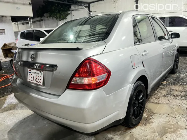 Nissan Tiida 2005 — foto 7