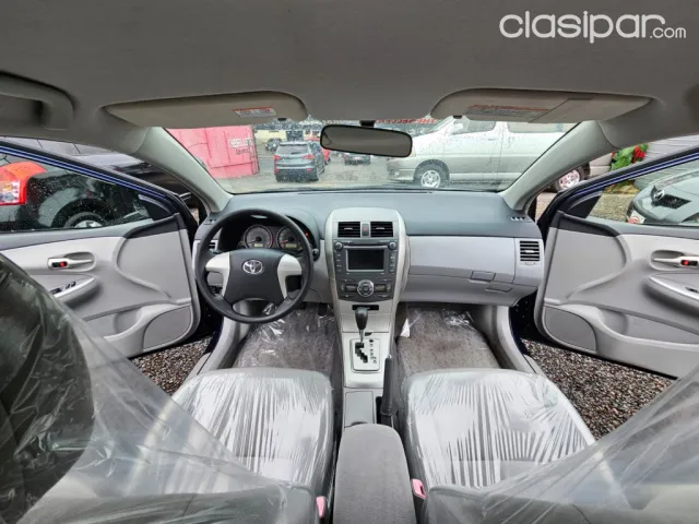 Toyota Axio 2007 — foto 6