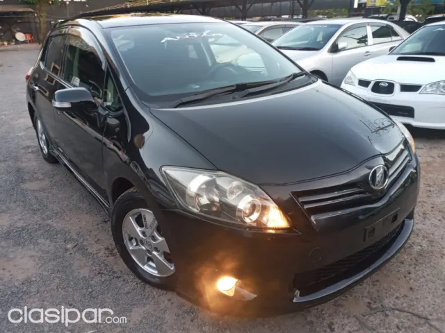 Toyota Auris 2009 — foto 2