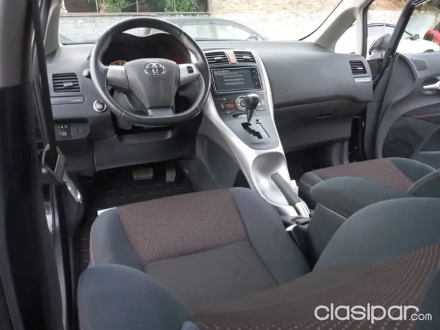 Toyota Auris 2009 — foto 7