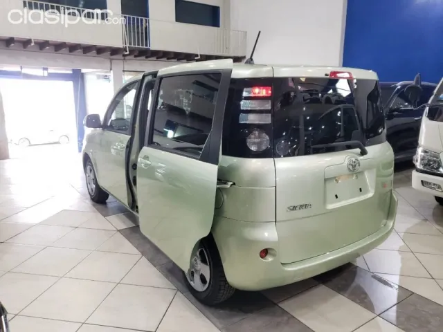 Toyota Sienta 2010 — foto 6