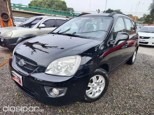 Kia Carens 2009 — foto 2