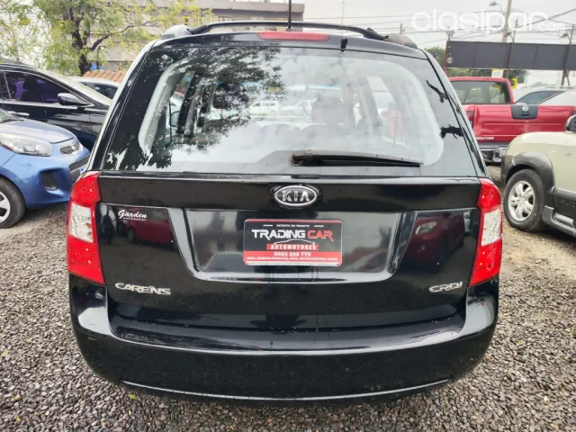 Kia Carens 2009 — foto 3