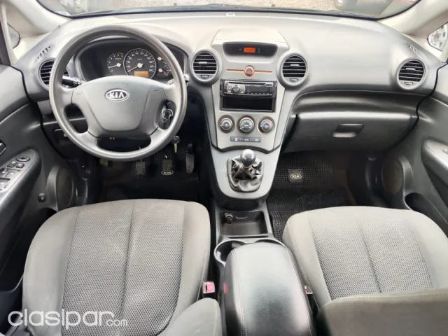 Kia Carens 2009 — foto 7