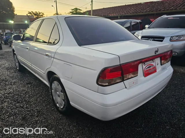 Nissan Sunny 2004 — foto 3