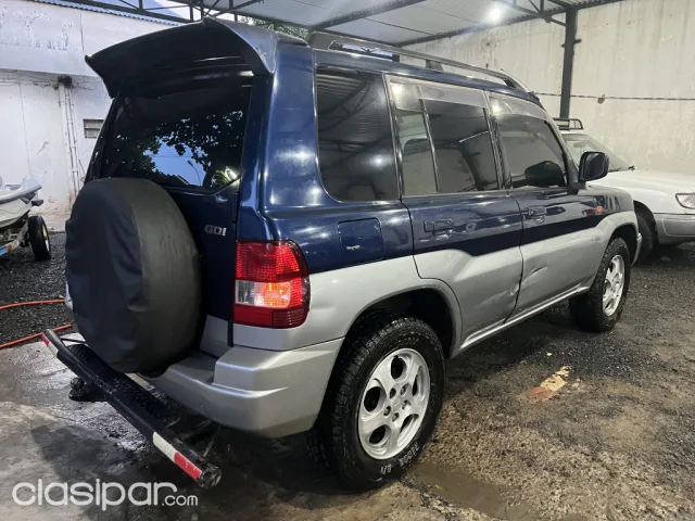 Mitsubishi Pajero Io 2000 — foto 7