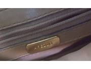 Vendo cartera de cuero marca Arezzo para dama