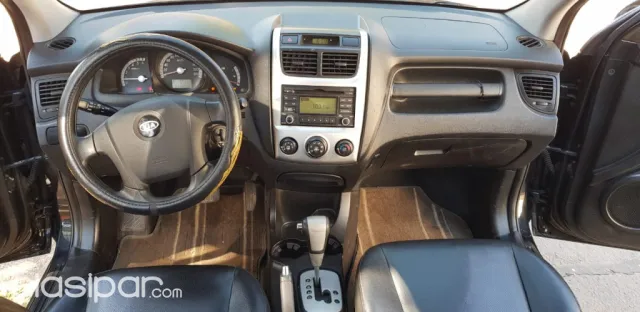 Kia Sportage 2010 — foto 2