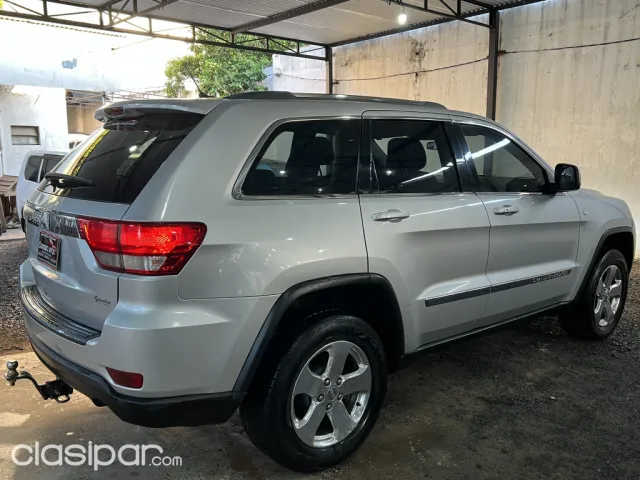 Jeep Grand Cherokee 2012 — foto 7