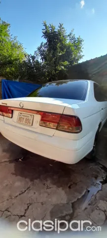 Nissan Sunny 2004 — foto 5