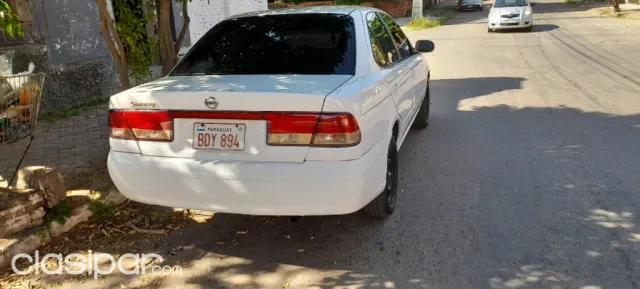 Nissan Sunny 2004 — foto 7