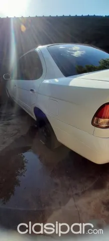 Nissan Sunny 2004 — foto 8