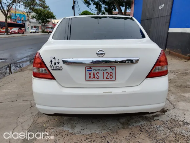Nissan Tiida 2004 — foto 6
