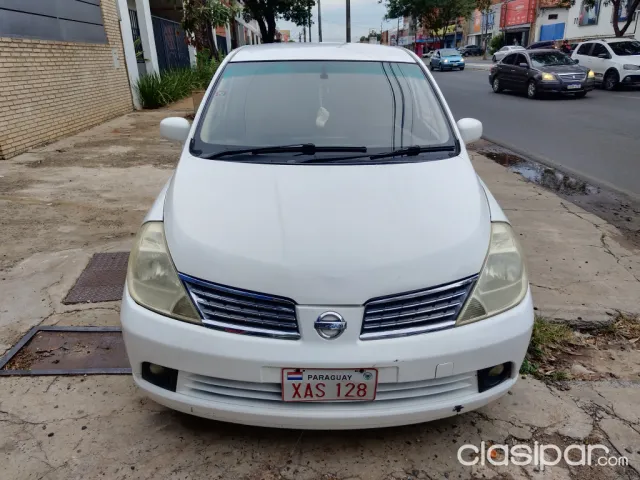 Nissan Tiida 2004 — foto 7