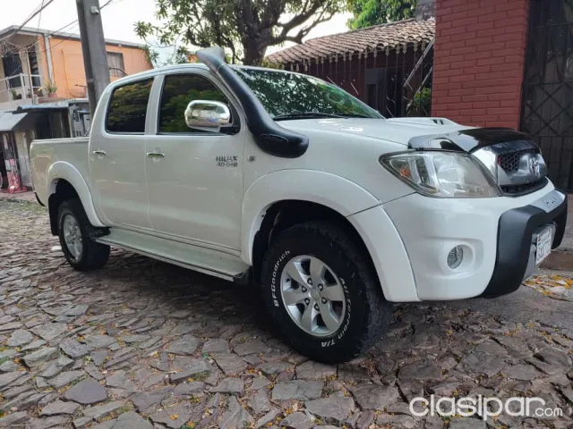 Toyota Hilux 2011 — foto 2