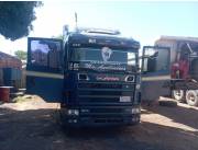 CAMION VOLQUETE SCANIA 124/400 TRUCADO CON CACHAMBA TRIPLE EJE.