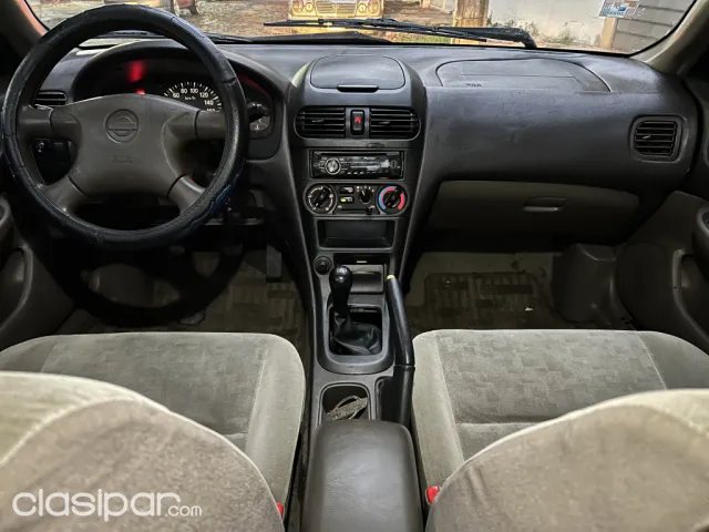 Nissan Sunny 2001 — foto 7