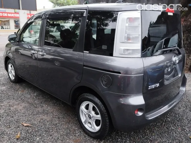 Toyota Sienta 2011 — foto 7