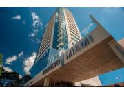 ED. MIAMI TOWER: ELEGANTE DPTO. AMOBLADO, 2 DORMITORIOS, AMENITIES, AREA CLUB, 1.300 USD.