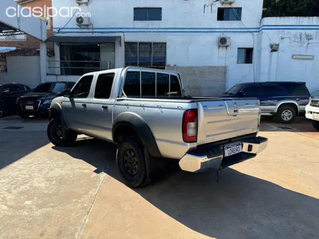 Nissan Ax 2011 — foto 7