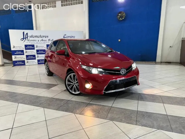 Toyota Auris 2012 — foto 2