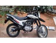 Vendo Moto kenton tipo Trail en buen estado precio conversable