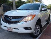 Vendo mazda bt50 año 2013 automático turbo diésel 4x4 único.dueño titulo CD verde en mano