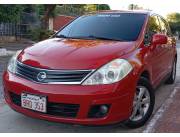 Vendo hermoso nissan versa 2009 naftero volante original titulo del representante