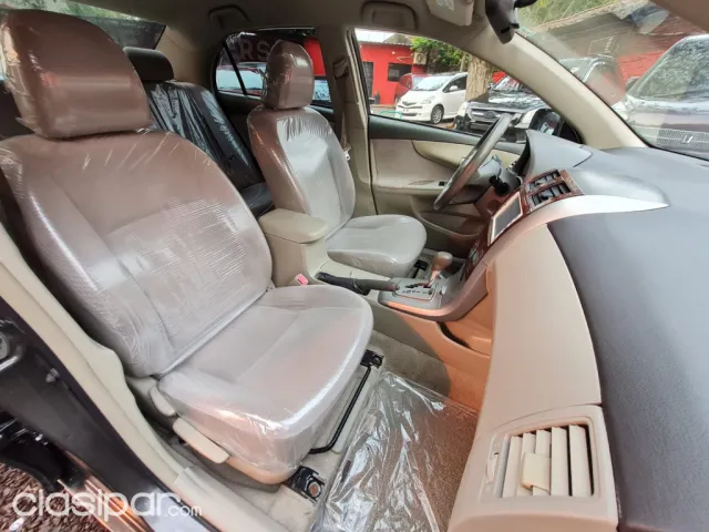 Toyota Axio 2010 — foto 4