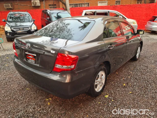 Toyota Axio 2010 — foto 6