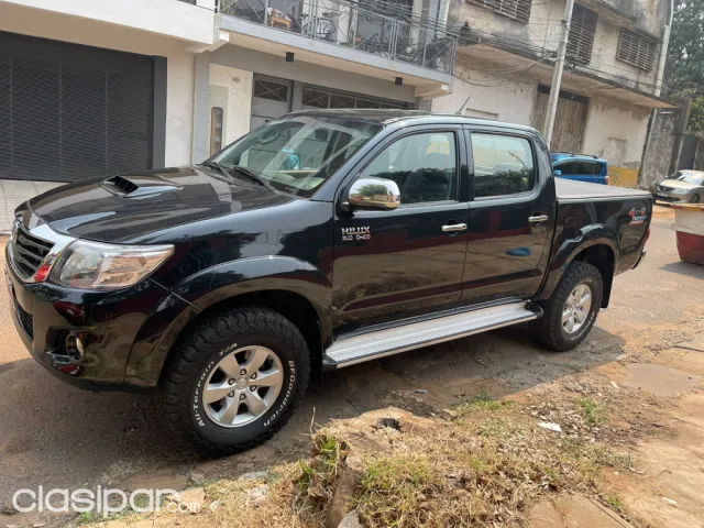 Toyota Hilux 2014 — foto 2
