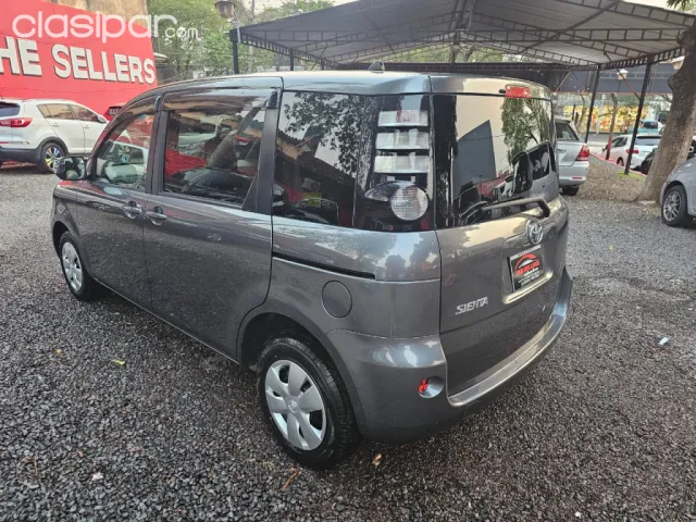 Toyota Sienta 2010 — foto 6