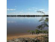 Campo Natural en Villa Oliva sobre Ruta y costa al Río Paraguay - 150 Ha.