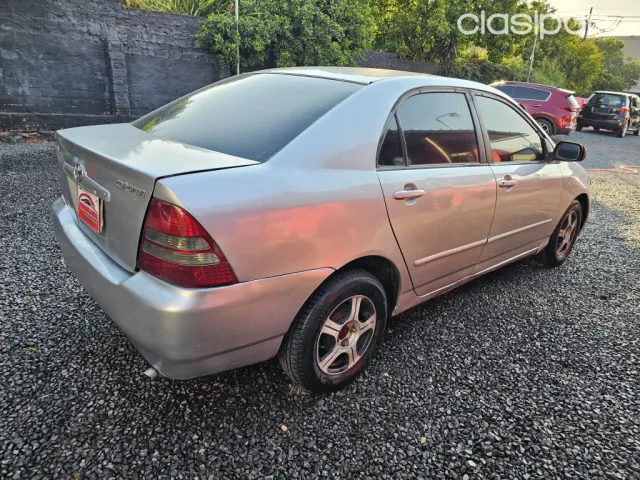 Toyota Corolla 2002 — foto 6