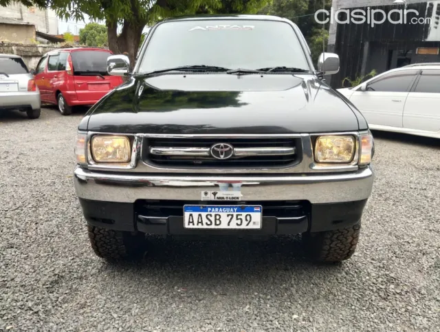 Toyota Hilux 1997 — foto 3