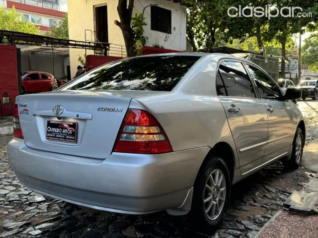 Toyota Corolla 2004 — foto 7