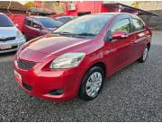 Hermoso Toyota Belta Rec. Import. Con poco kilometraje color bordo año 2011 real motor vvt