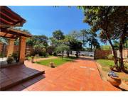 En San Lorenzo vendo terreno de 506 Mts2 con Casa.
