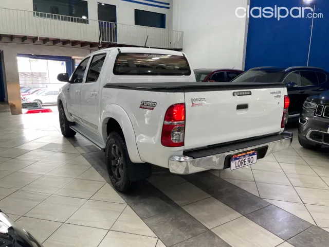 Toyota Hilux 2014 — foto 3