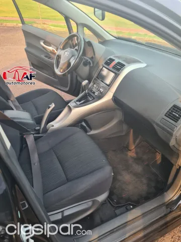 Toyota Auris 2009 — foto 7