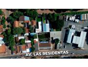 Amplio terreno con locales comerciales sobre Av. Las Residentas
