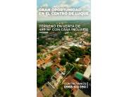 Terreno con casa incluida en el centro comercial de Luque