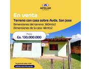 Terreno con casa