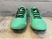 Botin de futbol usado