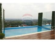 En Venta Moderno y amplio departamento Edificio Robelini, barrio San Vicente Asuncion.