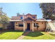 hermosa casa con local comercial