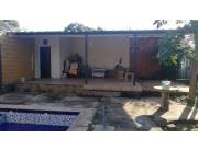 Vendo una casa totalmente amurallada a dos cuadras de la Ruta Mcal. Estigarribia