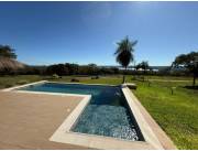 Se vende Casa de 4 Dormitorios en suite, con vista al Lago. Amoblada. A estrenar